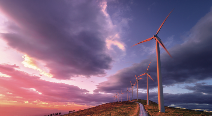 Wind turbines at sunset